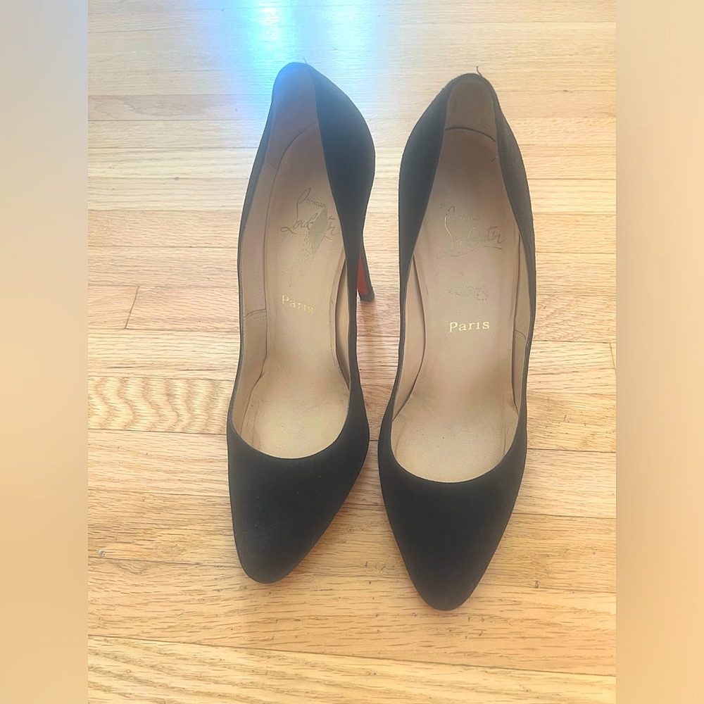 Original Louboutins w/re-soled red bottoms